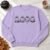 Spooky Ghosts embroidery design stitched across the front of a crewneck sweatshirt