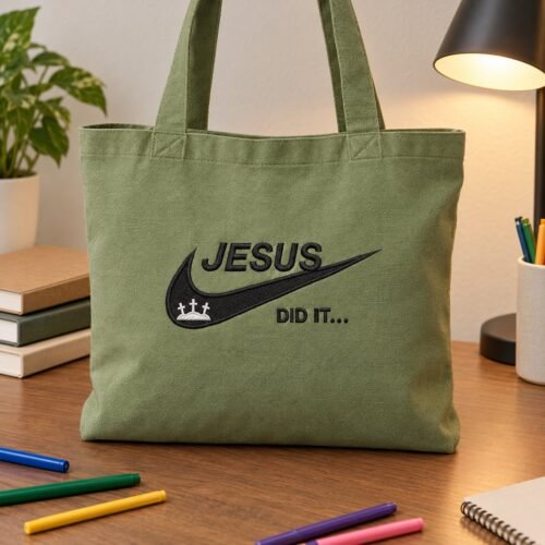 Diseño de bordado "Jesus Did It Swoosh" bordado en un bolso de mano.
