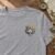 Tiger King embroidery design stitched as a left-chest logo on a t-shirt