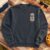 Modelo Especial Beer embroidery design stitched as a left-chest logo on a crewneck sweatshirt