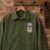 Modelo Especial Beer embroidery design stitched as a left-chest logo on a work jacket