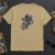 Cosmonaut in Space embroidery design stitched on a t-shirt
