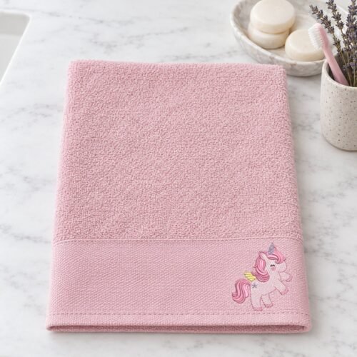 Cute Unicorn Sketch embroidery design stitched in the corner of a hand towel