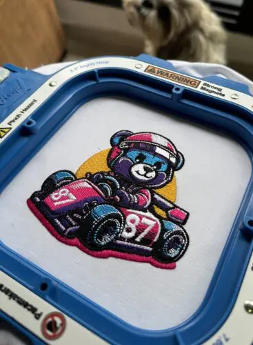 Cute bear racing a car