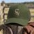 3D Equine Silhouette embroidery design stitched on the front of a trucker cap