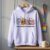 Diseño bordado de Winnie the Pooh con temática de enfermera pediátrica, bordado en la parte delantera de una sudadera con capucha.