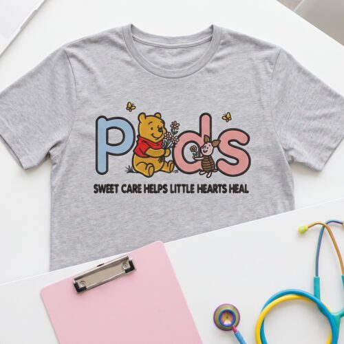 Diseño de bordado de Winnie the Pooh para enfermera pediátrica bordado en una camiseta.