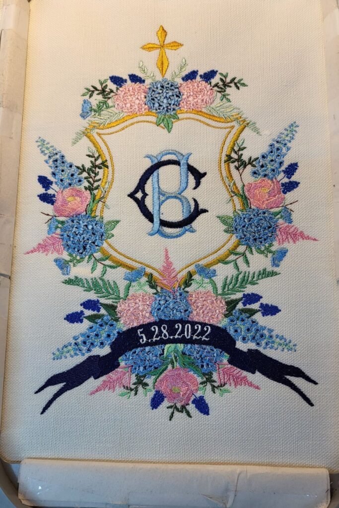 Wedding monogram embroidery stitched out on fabric