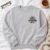 One Mental Breakdown Later embroidery design stitched on a crewneck sweatshirt
