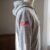 Reversed USA Flag embroidery design stitched on a hoodie sleeve