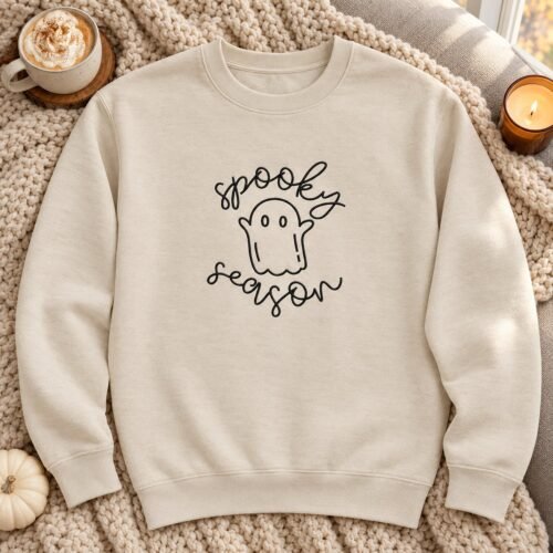 Spooky Season Ghost embroidery design stitched on a crewneck sweatshirt