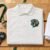 Mustang Horse Head Mascot Applique and Filled embroidery design stitched on a polo shirt