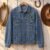 Mustang Horse Head Mascot Applique and Filled embroidery design stitched on a denim jacket