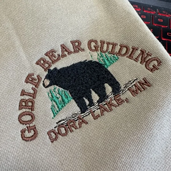 Globe Bear machine embroidery design logo