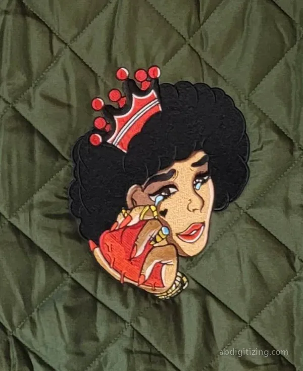 machine emboridery design for a poker queen gambling holding a heart on her hand